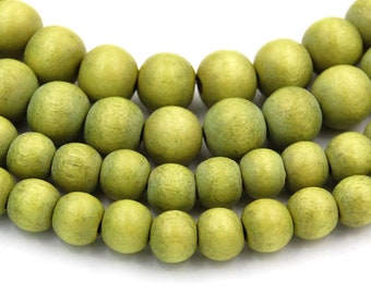 Deux brins de 16", perles en bois vert pomme, rondelles de bois vert 8 mm, 10 mm ou 8 x 5 mm