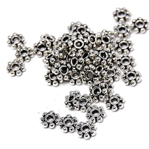 200 kralen, antiekzilveren madeliefje spacer 4,5 mm, 6 mm kralen