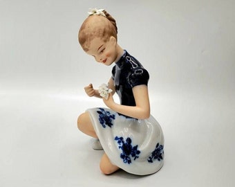 Vintage Wallendorf Cobalt Figurine of a Girl Kneeling While Holding Flowers
