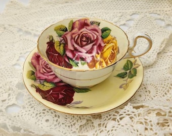 Aynsley Teacup and Saucer, Three Large Multi Color Roses, Pale Yellow Cup and Saucer