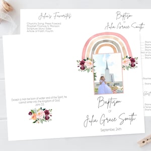 May include: A baptism certificate with a watercolor rainbow, floral accents, and a photo of a person in a white dress. The text reads "Baptism of Julia Grace Smith, September 24th".