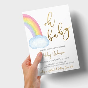 May include: A baby shower invitation with a watercolor rainbow and cloud design. The text reads "oh baby" in gold script and includes the details of the shower, including the date, time, location, and RSVP information.