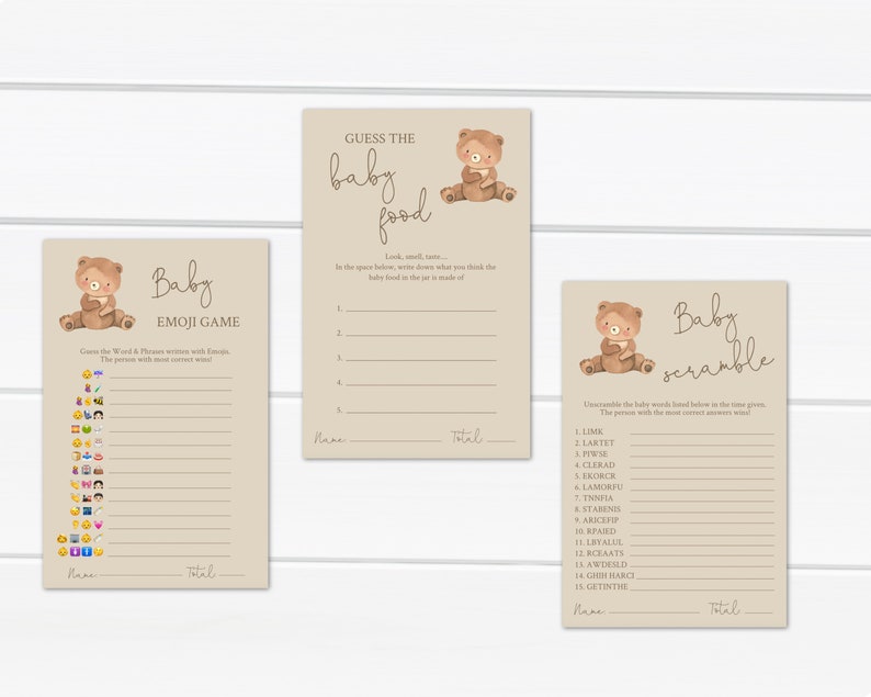 May include: Three printable baby shower game cards with a brown teddy bear illustration. The games are called "Baby Emoji Game", "Guess the Baby Food", and "Baby Scramble".