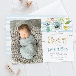 May include: A blue and white striped baby shower invitation with a watercolor floral design. The invitation features a photo of a baby boy and the text "PLEASE JOIN US FOR THE BLESSING OF OUR SON Oliver Williams SATURDAY, MARCH 29TH, 2022 AT TWO O'CLOCK IN THE AFTERNOON 34 MAIN STREET, CALIFORNIA CA LUNCH TO FOLLOW"