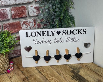 Beautiful "Lonely Socks" peg board for organising all your odd socks