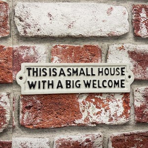 Cast Iron &quot;This is a small house with a big welcome&quot; sign - cute plaque for the welcoming house