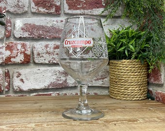 Engraved Cruzcampo Pint or Half-Pint Glass. Personalised with your message.