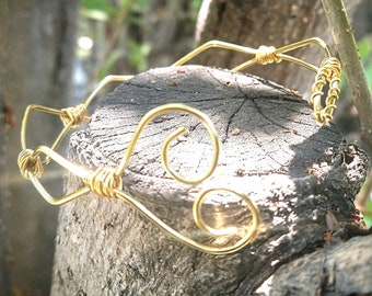 Gold wire wrapped arm cuff