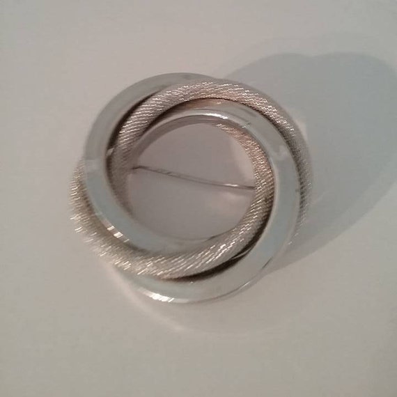 Vintage Infinity Knot Brooch Pin. Silver toned Entwined Infinity Knot, Two Textured Spiral Silver Rings, #VintageGift, #Friendshipgift