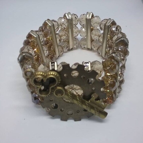 Steampunk Beaded Stretch Cuff, Gear and Key