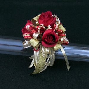 Glitzy Gold and Red Wrist Corsage