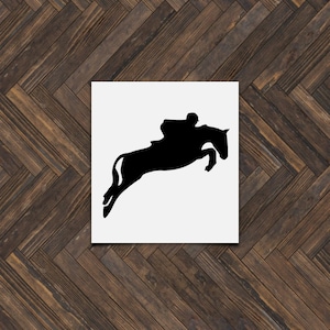 May include: Silhouette of a horse jumping over an obstacle with a rider on its back.