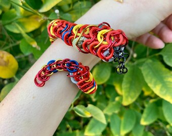 Mini Chain-ger Noodle! Red, Yellow, and Blue— chainmail snake, rubber and anodized aluminum