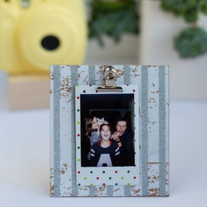 Instax Photo Frame. Instax Mini photo holder. For Fujifilm Instax Mini or Fujifilm Instax SQ photo size. Silver / Gold Design. Tabletop.
