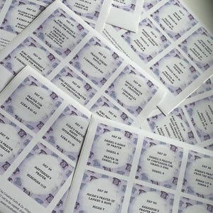 May include: A collection of printed cards with various Bible verses and prayers, featuring a telephone graphic. Each card is labeled with a day number and a specific prayer topic, such as "Prayer for Protection" or "Daniel's Habit of Prayer."