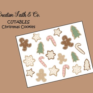 May include: A sheet of printable Christmas cookie cutouts. The sheet features gingerbread men, candy canes, snowflakes, and Christmas trees. The text "CUTABLES Christmas Cookies" is printed at the top of the sheet.