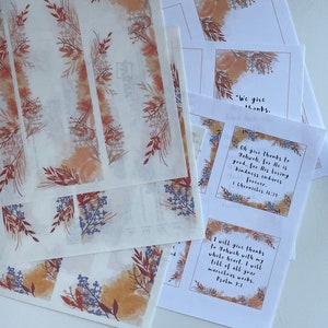 May include: Printable cards with a watercolor floral design and inspirational quotes about giving thanks. The cards feature the text "We give thanks", "Oh give thanks to Jahuch. for He is good, for His loving kindness endures forever. 1 Chronicles 16:39", and "I will give thanks to Jahuch with my whole heart. I will tell of all your marvelous works. Psalm 9:1".