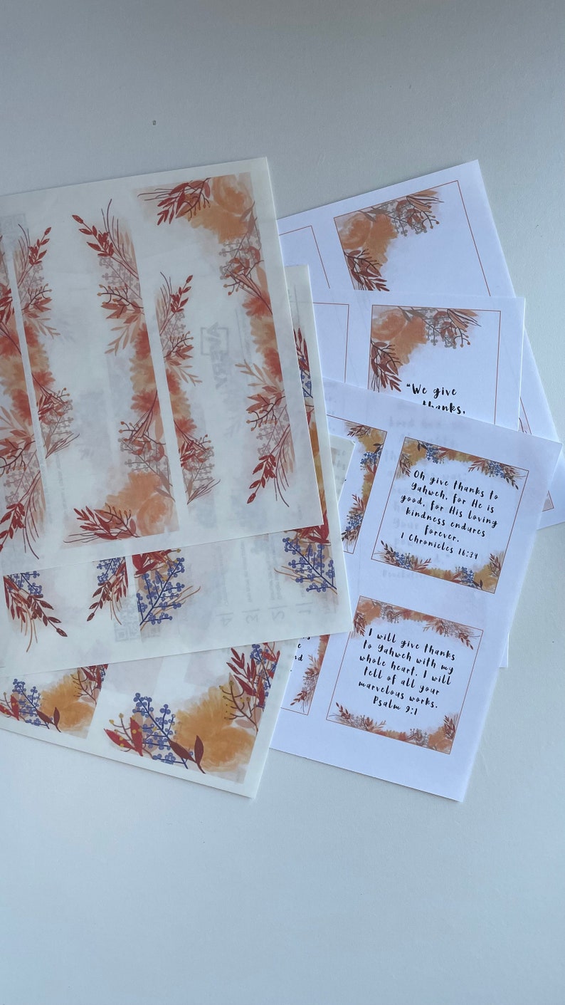 May include: Printable cards with a watercolor floral design and inspirational quotes about giving thanks. The cards feature the text "We give thanks", "Oh give thanks to Jahuch. for He is good, for His loving kindness endures forever. 1 Chronicles 16:39", and "I will give thanks to Jahuch with my whole heart. I will tell of all your marvelous works. Psalm 9:1".