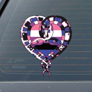 May include: A sticker featuring two snakes intertwined in a heart shape, with the colors of the bisexual pride flag. The snakes are pink, blue, and black, and the heart is outlined in black.