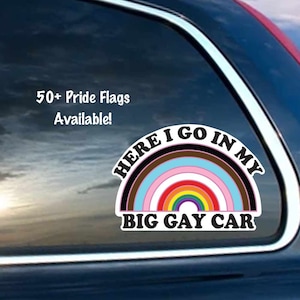 May include: A rainbow pride flag sticker with the text "Here I go in my big gay car".