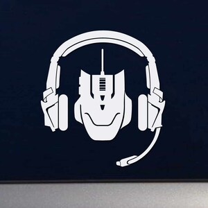 May include: White silhouette of a gaming headset and mouse, with the microphone extending from the headset. The headset has a large earcup on each side and a headband that goes over the top of the head. The mouse has a scroll wheel and two buttons.