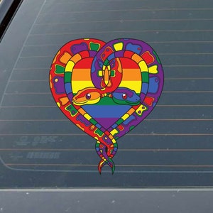 May include: A colorful sticker featuring a heart-shaped design with a rainbow flag pattern. Two snakes with orange and green eyes are intertwined within the heart. The sticker has a vibrant, eye-catching appearance.