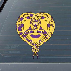 May include: A yellow heart-shaped design with two purple and yellow snakes intertwined. The snakes have yellow scales and purple markings. The snakes' heads are facing each other and their eyes are closed.
