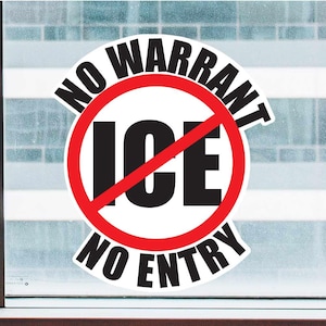 May include: A white sticker with a red circle and a diagonal red line through the word "ICE". The text "NO WARRANT NO ENTRY" is written around the circle.