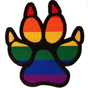 May include: Rainbow paw print patch with red, orange, yellow, green, blue, and purple stripes.