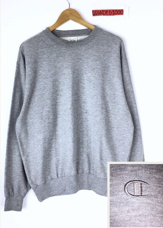 champion jumper small logo