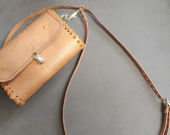 Small genuine leather handbag with strap