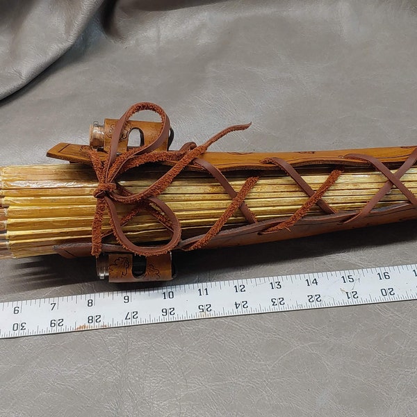 Genuine leather parasol holder with oak leaf motif and potion bottles