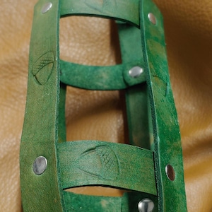 Genuine leather hand made water bottle holder with acorn motif