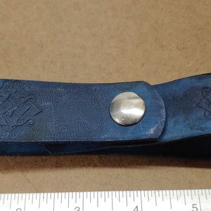 Embossed genuine leather tankard strap
