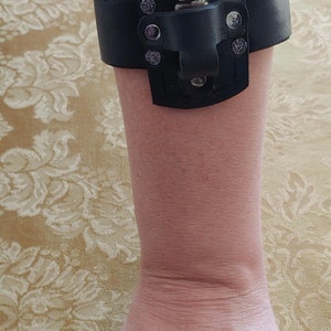 potion holder bracelet in black color genuine leather