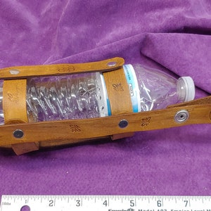 Genuine leather hand made water bottle holder with bee and honeycomb motif