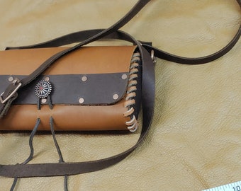 Small genuine leather handbag with strap