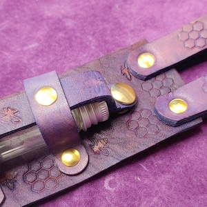 potion bottle holder with honey bee motif genuine leather