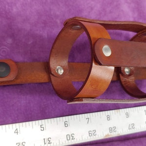 Genuine leather hand made beer bottle holder in brown