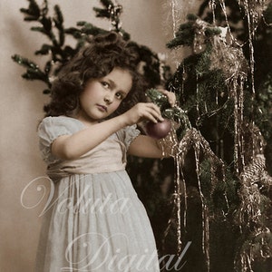 Cute girl decorating the Christmas tree. Digital download  -  Edwardian Vintage Postcard.