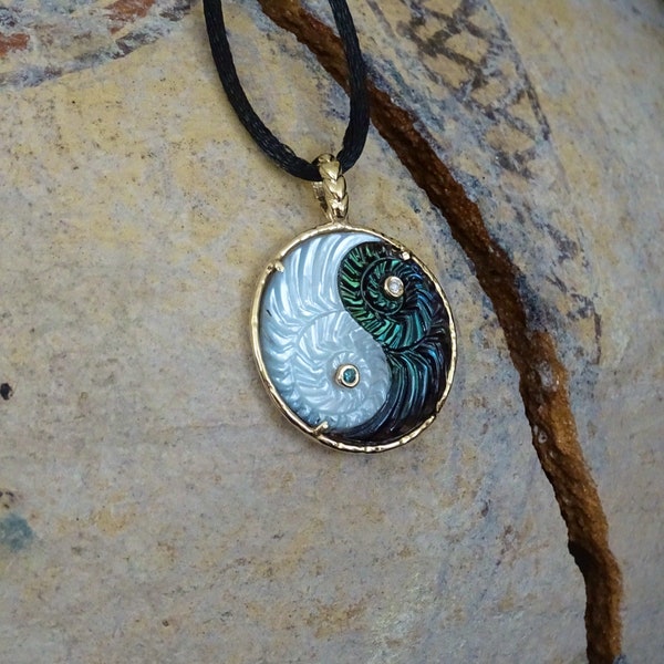 Carved black Iridescent Pinna Shell  and White  Mother-of-pearl 14k yellow gold  Yin Yang  pendant , blue, white diamonds.