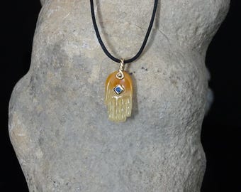 Carved natural Calcite Hamsa hand 14k gold pendant , blue Sapphire .