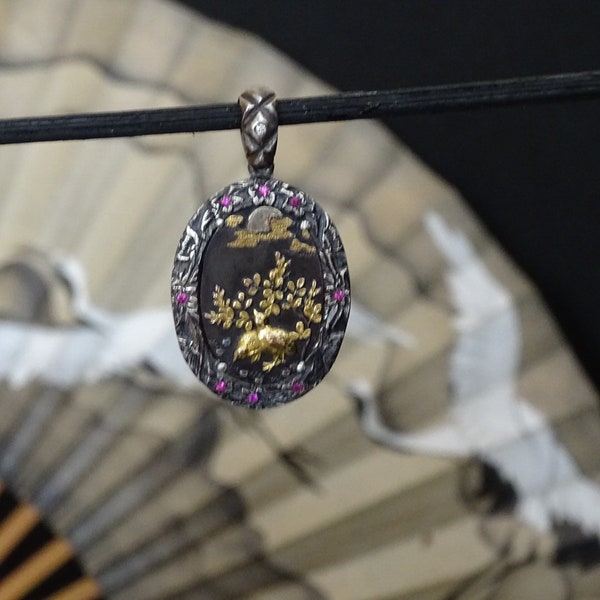 925 silver pendant with Antique Japanese Shakudo plaque  , hand engraved , genuine rubies and diamond.