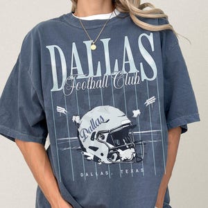 Dallas football shirt, vintage graphic tee, unisex navy and silver streetwear style Dallas Texas, football helmet, game day apparel