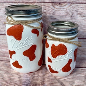 Cow print mason jars/black cow brown cow decor/ farm themed birthday decor/farm animal party decor/decorative mason jars/cow mason jar bank