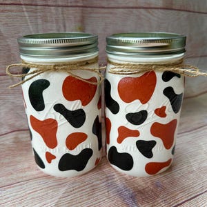 Cow print mason jars/black cow brown cow decor/ farm themed birthday decor/farm animal party/holy cow/rodeo western decor/barnyard birthday