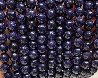Blue Goldstone Oval 7 Bead Strand