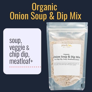 May include: A clear bag of organic onion soup and dip mix from Pinch Spice Market. The label reads "Organic Onion Soup & Dip Mix" and lists uses for chip dip, soup, and meatloaf. The text "soup, veggie & chip dip, meatloaf+" is also visible.