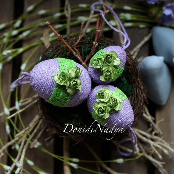 Easter eggs lilac with small paper flowers and laces.  Hanging Easter handmade decor