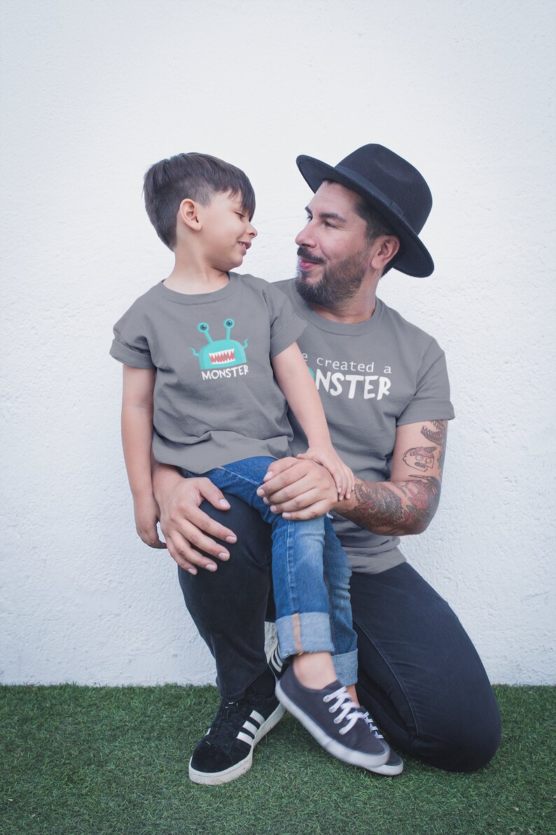 father and infant matching shirts